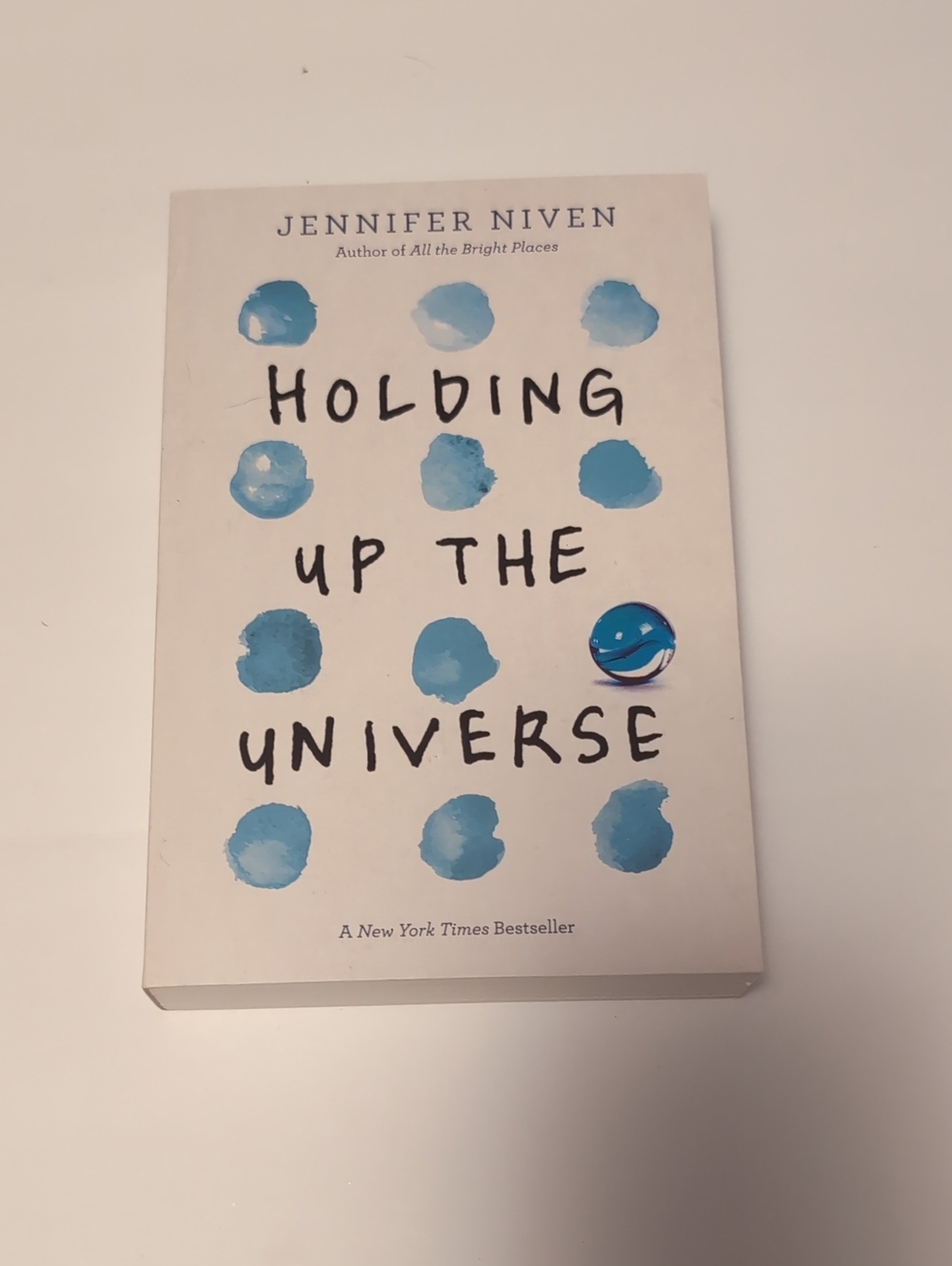 Holding Up the Universe by Jennifer Niven — White & Blue Paperback